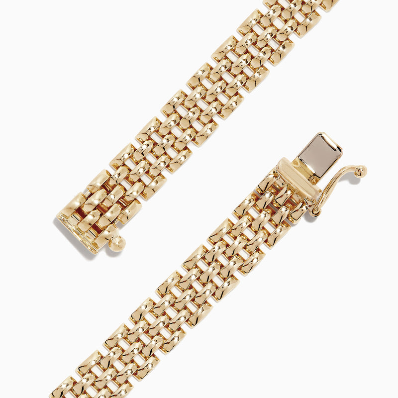 The Signature 14K 2-Tone Gold Diamond and Emerald 7 Bracelet (1.35 TCW) features two panther head designs with green eyes and black spots, each facing the other and holding a circular ring in their mouths against a white background.
