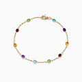 The Mosaic 14K Yellow Gold Multi Gemstone Station Bracelet, 2.47 TCW, features round red, green, blue, purple, and amber gemstones spaced along a delicate chain with a secure lobster clasp.