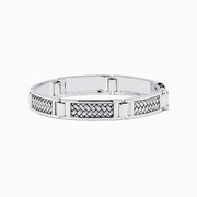 The Mens 925 Sterling Silver Bracelet features silver-toned rectangular links with inset woven patterns, offering a modern, polished look. Crafted in 925 sterling silver, its displayed on a white background.