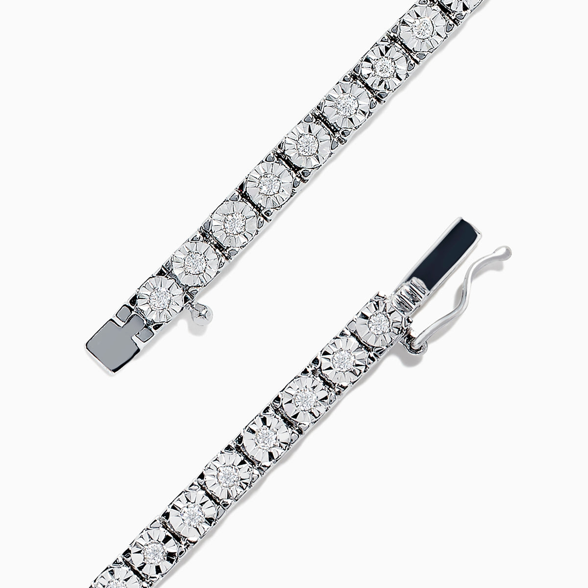 The Pave Classica 14K White Gold Diamond Tennis Bracelet features a sleek design with 0.51 total carat weight of diamonds set in a flexible, continuous band for timeless elegance.