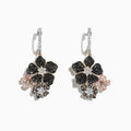 The Nature 14K Tri Color Gold Diamond Flower Earrings, 2.04 TCW, feature black and white flower designs with sparkling stones and tri-color gold accents, shown on a white background.