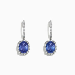 Elegant 14K white gold earrings featuring oval tanzanite gemstones and sparkling diamonds, totaling 4.14 TCW, with additional diamonds along the hooks.