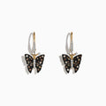 The Nature 14K Yellow Gold Espresso & White Diamond Butterfly Earrings feature black wings with sparkling stones, clear gems on the body and antennas, gold hooks, and a total weight of 0.57 TCW.