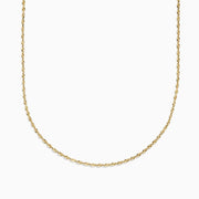 The 14K Yellow Gold Woven Rope Chain 22 is elegantly displayed against a white background, its delicate yellow gold links forming a gentle curve.