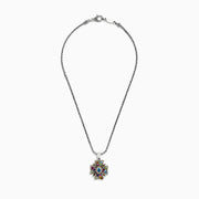 A 925 silver chain necklace featuring a cross-shaped pendant adorned with vibrant multi gemstones, totaling 4.09 TCW, arranged in a strikingly symmetrical design.