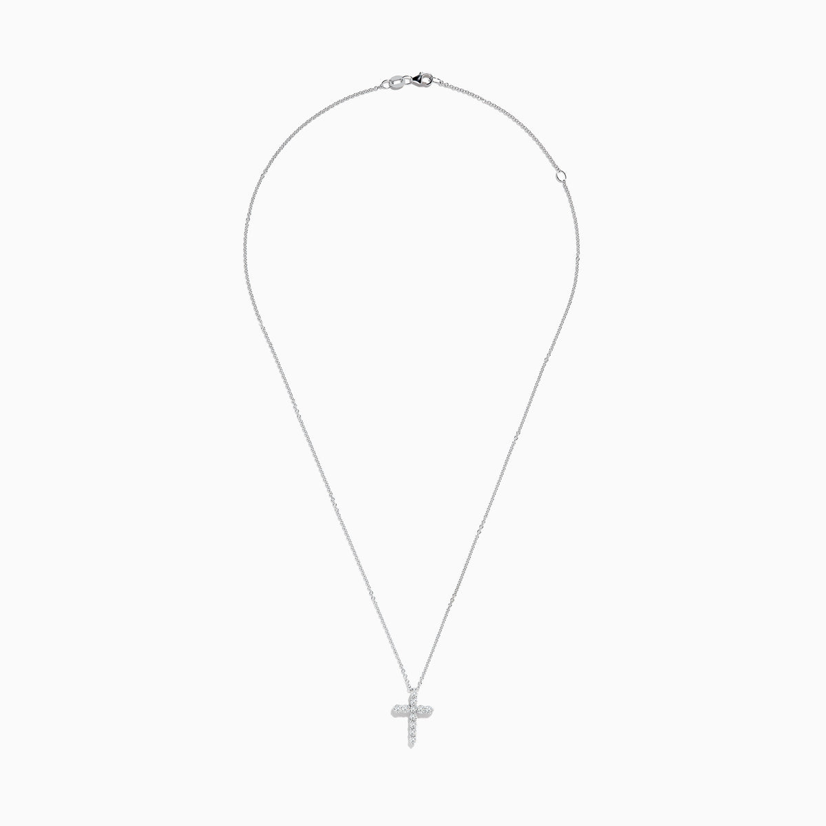 A 14K white gold Pave Classica diamond cross pendant (0.49 TCW) hangs from a delicate chain, showcased against a plain white background.