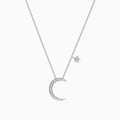 A Novelty 14K White Gold Diamond Crescent & Star Necklace (0.09 TCW) features a crescent moon pendant with sparkling diamonds and a separate star charm on a fine chain, shown against a white background.