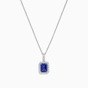 The Nahla Siri 14K White Gold Tanzanite and Diamond Pendant, 1.56 TCW, features a rectangular tanzanite surrounded by sparkling diamonds, elegantly displayed against a white background.