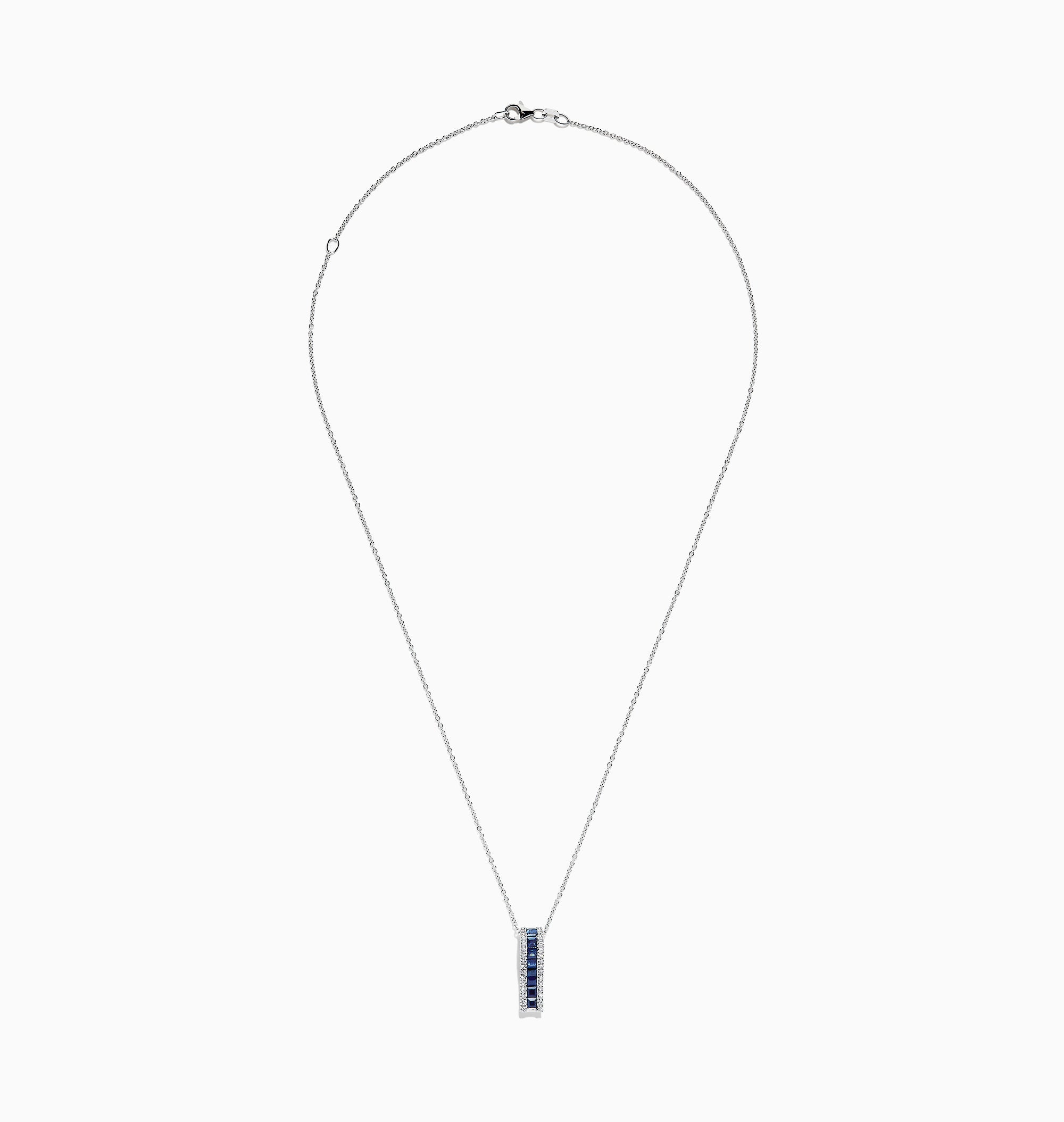 The 14K White Gold Blue Sapphire and Diamond Pendant (1.20 TCW) features a vertical design with square-cut blue sapphires at the center, bordered by sparkling diamonds.