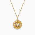 The 14K Yellow Gold Diamond Evil Eye Pendant features a round eye design accented with sparkling diamonds, set against a textured yellow gold background with a beaded edge.