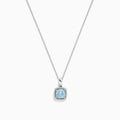 The Aquarius 14K White Gold Aquamarine and Diamond Pendant features a square light blue aquamarine surrounded by sparkling diamonds, all on a delicate chain. Total carat weight: 0.78 TCW.