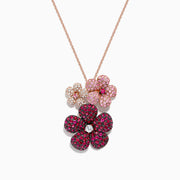 The Nature 14K Gold Ruby, Sapphire and Diamond Flowers Pendant (3.02 TCW) features three flower-shaped pendants in graduated sizes, set with rubies, sapphires, and diamonds; the largest flower displays a central sparkling diamond.