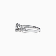 The Bouquet 14K White Gold Diamond Cluster Ring, 0.56 TCW, showcases a brilliant diamond cluster and a split shank band adorned with sparkling diamonds, beautifully presented on a white background.