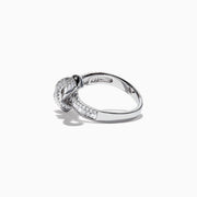 The Classique 14K White Gold Diamond Bow Ring, 1.08 TCW, features a striking bow design encrusted with diamonds and is showcased on a plain white background.
