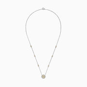 The Canare 14K Two-Tone Gold Yellow and White Diamond Station Necklace features a round pendant with clustered yellow and clear stones and yellow-accented settings along the chain.