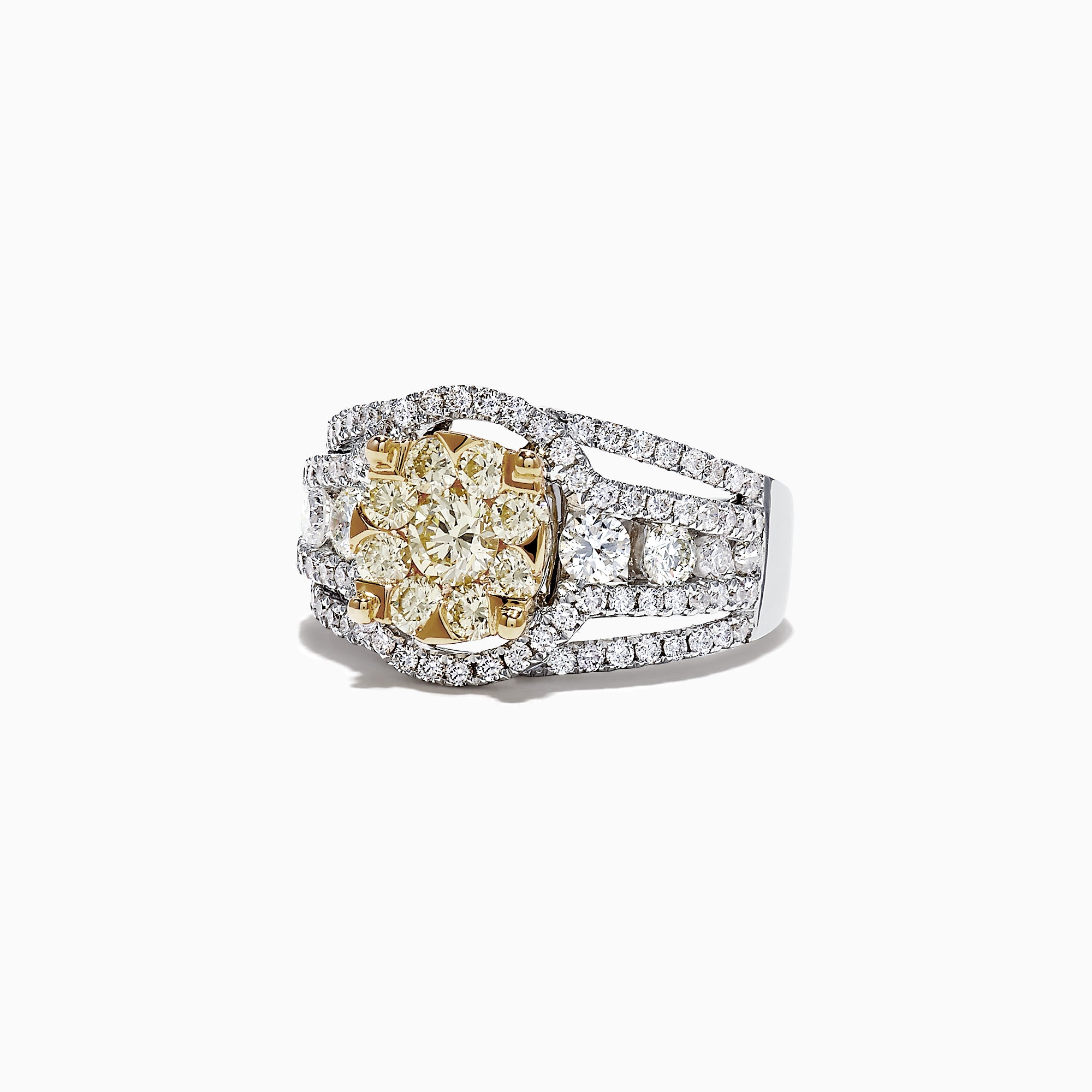 The Canare 14K Two-Tone Gold Yellow and White Diamond Ring, 2.16 TCW, showcases a striking yellow diamond cluster encircled by white diamonds on a split shank band, elegantly set against a white background.