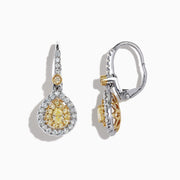 The Canare 18K Two-Tone Gold Double Halo Pear Shaped Yellow Diamond Earrings, 0.99 TCW, feature elegant teardrop-shaped yellow diamonds surrounded by double halos of white diamonds for timeless sparkle and sophistication.