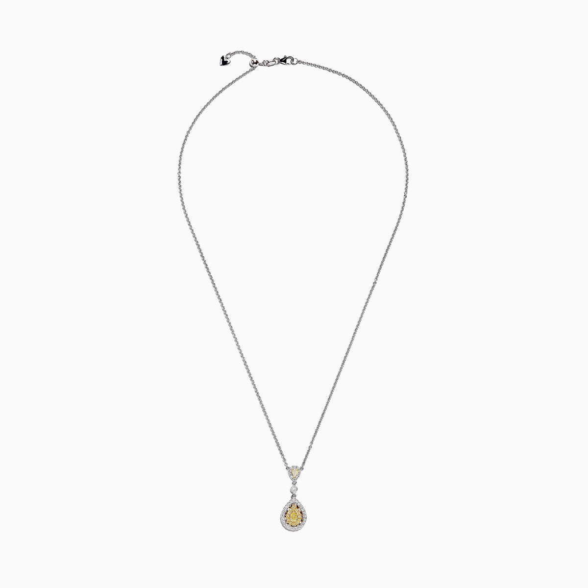 The Canare 18K Two-Tone Gold Yellow and White Diamond Pendant (0.74 TCW) is a silver necklace featuring a teardrop design with yellow gemstones and white diamonds, both surrounded by halos of sparkling stones for added elegance.