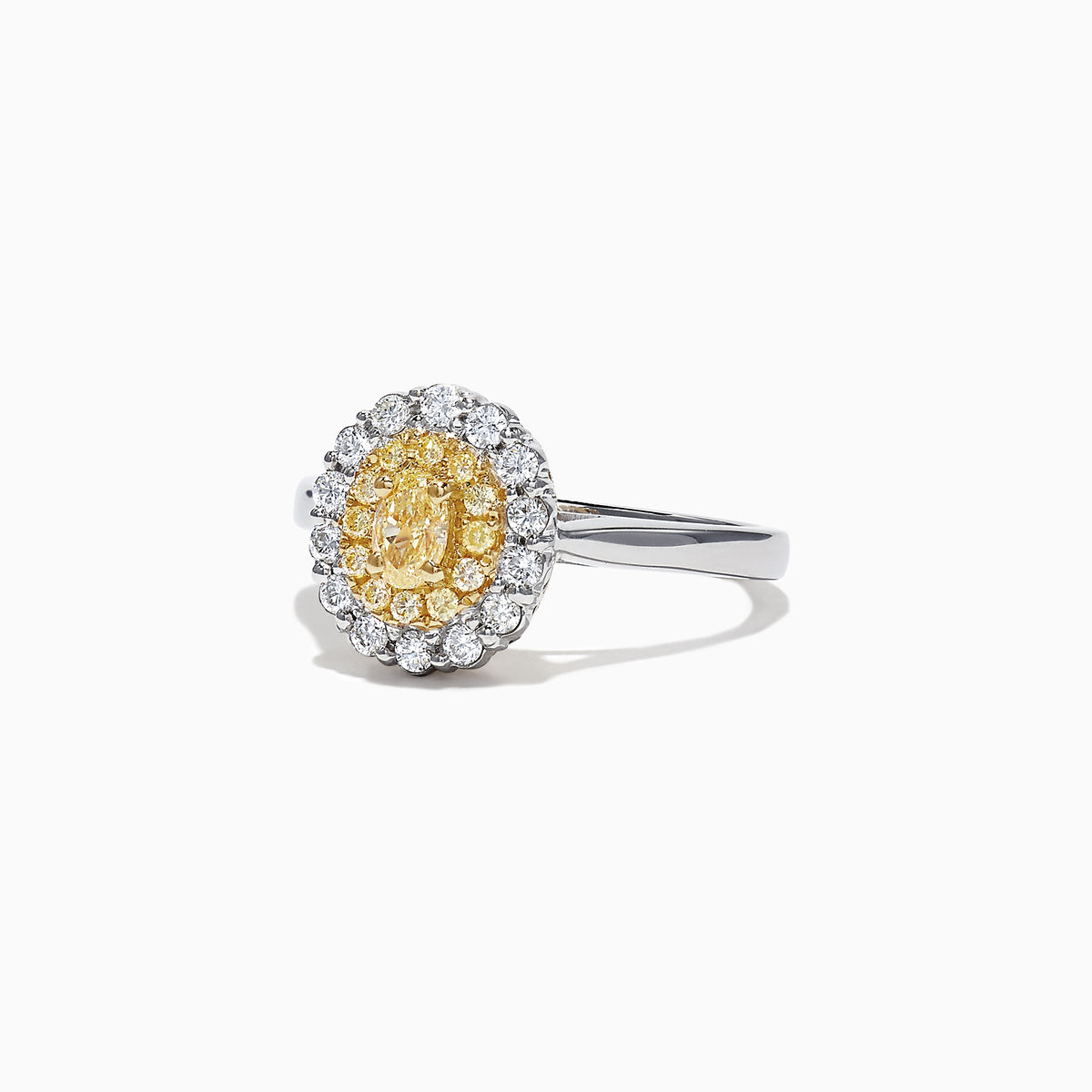 The Canare 18K Two-Tone Gold Oval Double Halo Yellow Diamond Ring, 0.65 TCW, features a central oval yellow diamond cluster and twin white diamond halos, elegantly set against a plain white background.