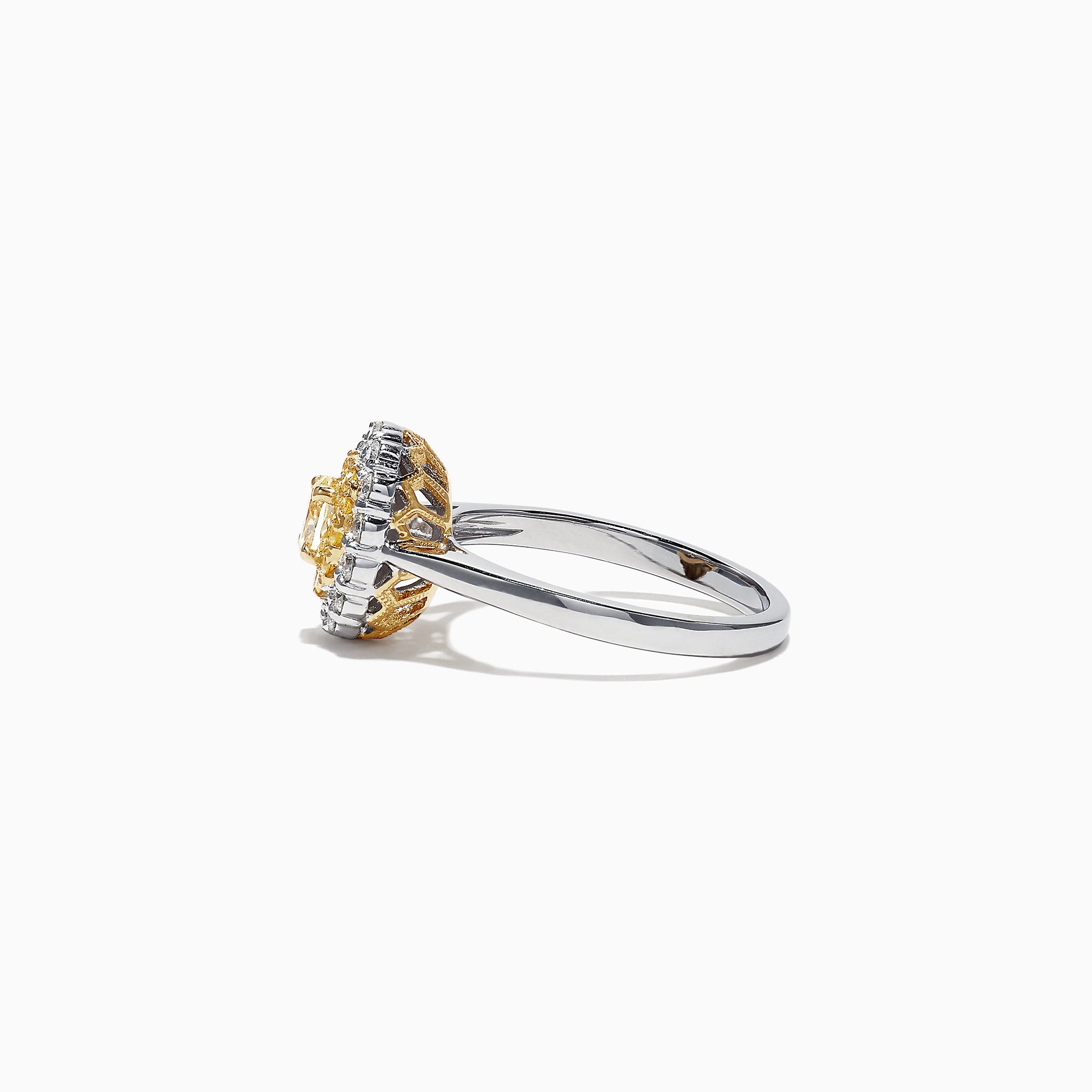 The Canare 18K Two-Tone Gold Oval Double Halo Yellow Diamond Ring, 0.65 TCW, features a central oval yellow diamond cluster and twin white diamond halos, elegantly set against a plain white background.