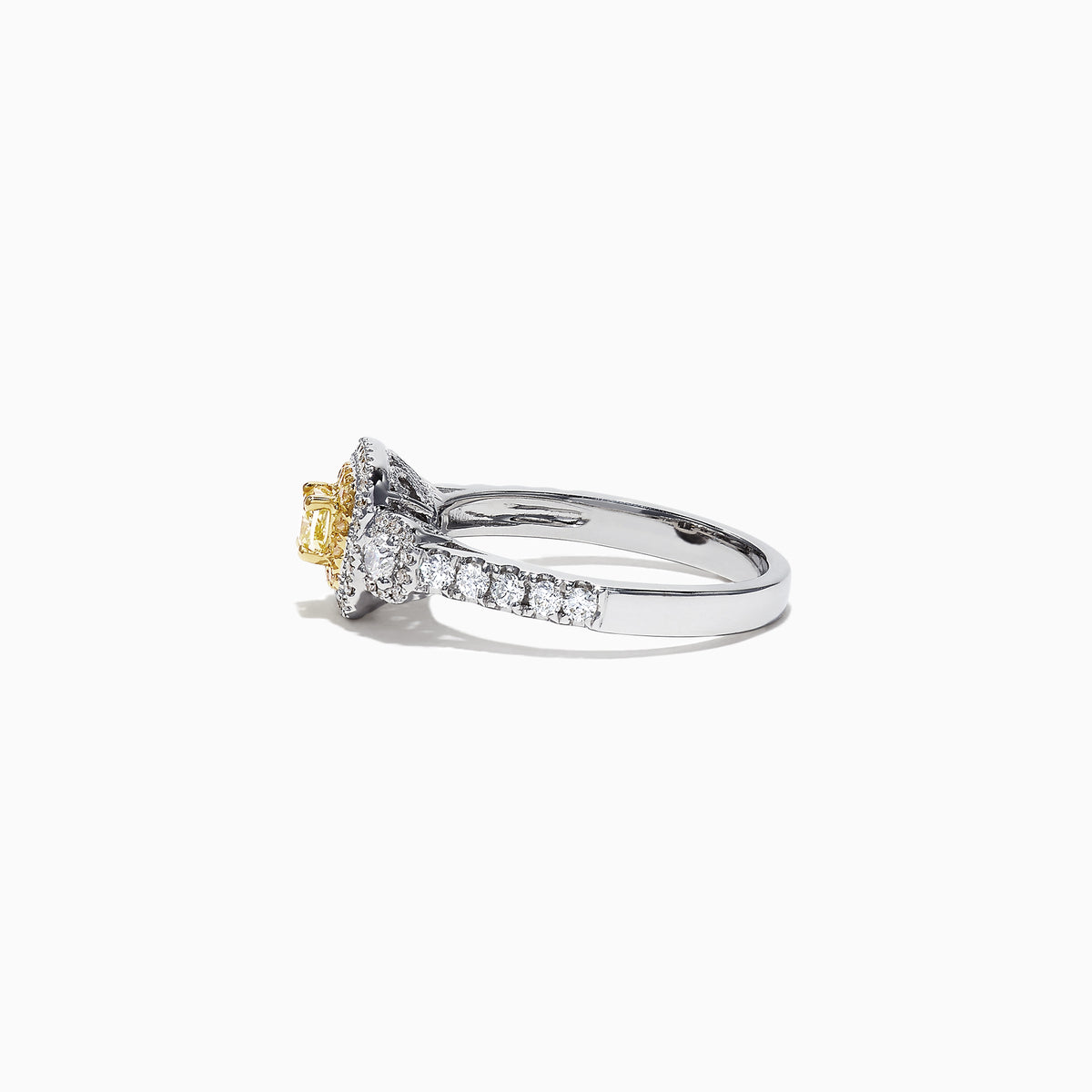 The Canare 18K Two-Tone Gold Cushion Double Halo Yellow Diamond Ring, 0.96 TCW, features a cushion-cut yellow diamond with a double white diamond halo and diamonds set along the band.