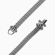The 925 Sterling Silver & 18K Yellow Gold Diamond Bracelet, 0.53 TCW, features a mesh chain with a diamond-encrusted cylindrical centerpiece accented by yellow gold bands, displayed on a white background.