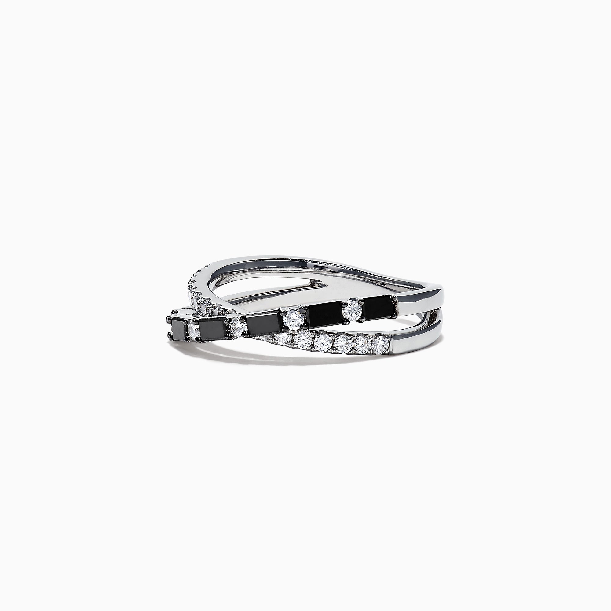The 14K White Gold Black and White Diamond Crossover Ring, 0.77 TCW, features two intertwined bands with alternating black and white diamonds, displayed on a white background.