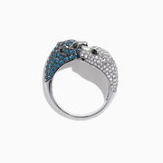 The Signature 14K White Gold Blue and White Diamond Panther Ring, 1.48 TCW, features two panther heads—one adorned with blue and white diamonds—facing each other on a sleek white gold band.