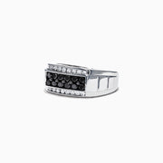 The Mens 14K White Gold Black and White Diamond Ring, 0.96 TCW, showcases a central row of black diamonds bordered by white diamonds in a rectangular design, all set on a polished white gold band.