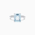 The Aquarius 14K White Gold Aquamarine and Diamond Ring (3.96 TCW) showcases a large rectangular aquamarine center stone, accented by small white diamonds along its slim white gold band.