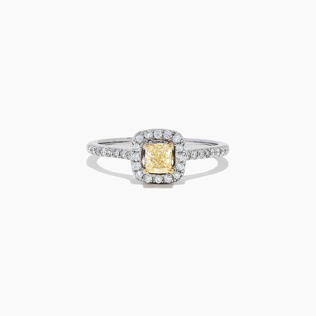 The Canare 18K Two-Tone Gold Cushion Halo Yellow Diamond Ring features a 0.61 TCW square yellow diamond center, surrounded by a halo of clear diamonds and additional diamonds on the band.