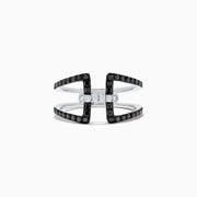 A striking 14K White Gold Black and White Diamond Ring, 0.49 TCW, showcases an open geometric design with two parallel black diamond bands connected by a central row of sparkling white diamonds.
