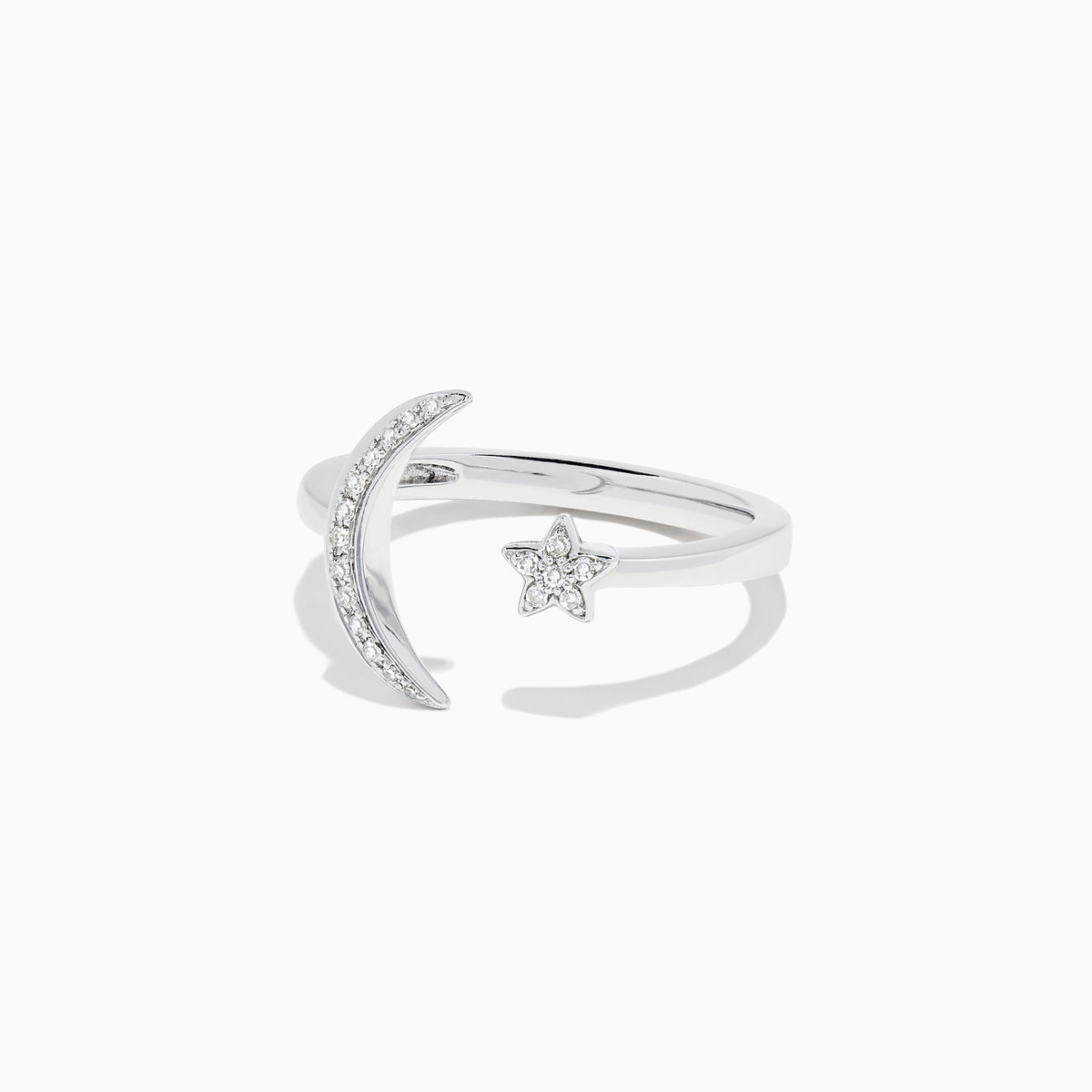 The Novelty 14K White Gold Moon and Star Diamond Ring, 0.08 TCW, features a crescent moon with diamonds on one side and a diamond-studded star on the other, beautifully set in white gold.