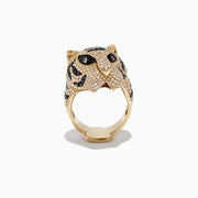 The Safari 14k Yellow Gold Black and White Diamond Tiger Ring (1.85 TCW) showcases a tiger’s head in yellow gold, detailed with black and white diamonds for the eyes and stripes, set on a white backdrop.