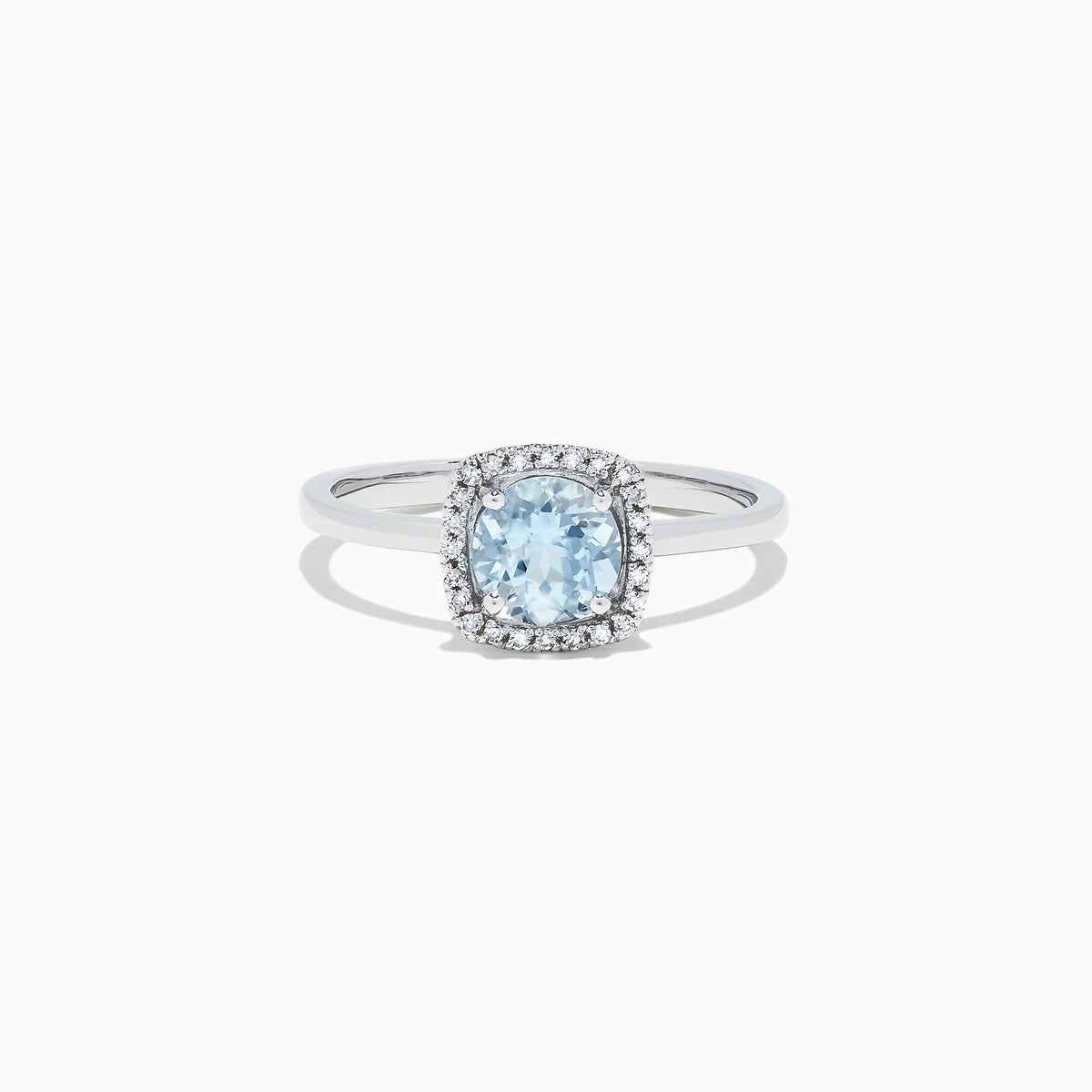 The Aquarius 14K White Gold Aquamarine and Diamond Ring, 0.78 TCW, features a cushion-cut aquamarine center with a diamond halo, shown on a white background.