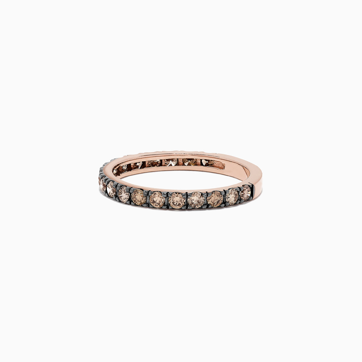 The 14K Rose Gold Brown Diamond Stacking Ring, 0.65 TCW, showcases a full circle of round brown diamonds in a channel setting, perfect for stacking and shown against a white backdrop.