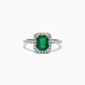 The Brasilica 14K White Gold Emerald and Diamond Ring, 1.69 TCW, features a rectangular green emerald center stone with a halo of round diamonds and additional diamonds on the band, shown against a white background.