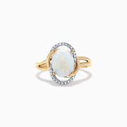 The Aurora 14K Two Tone Gold Opal and Diamond Ring, 1.49 TCW, showcases an oval opal center surrounded by white diamonds on a split-shank band, presented against a white background.