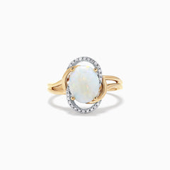 The Aurora 14K Two Tone Gold Opal and Diamond Ring, 1.49 TCW, showcases an oval opal center surrounded by white diamonds on a split-shank band, presented against a white background.
