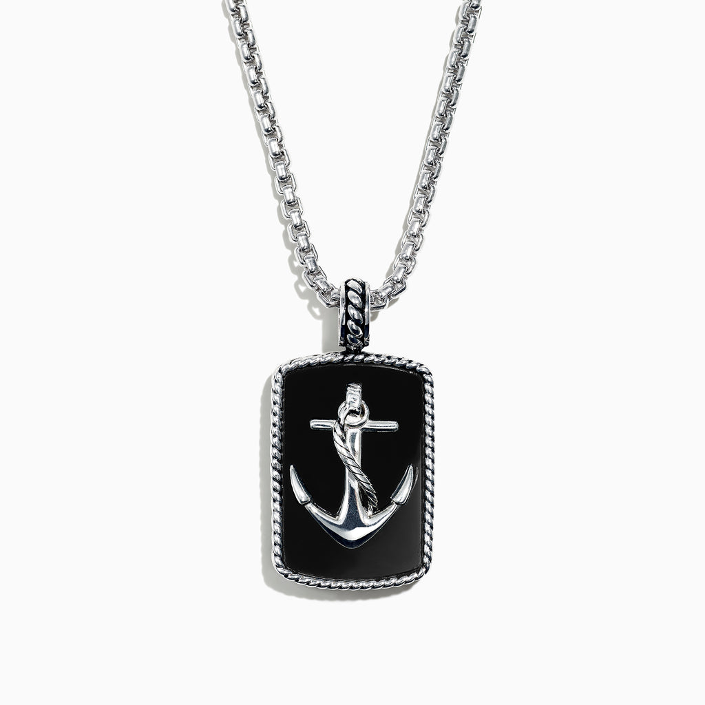 The Mens Sterling Silver Onyx Anchor Dog Tag Pendant, 18.85 TCW, features a rectangular onyx center with a raised silver anchor and rope-like border, creating a bold and striking accessory for men.