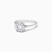The Bouquet 14K White Gold Diamond Cluster Ring, 0.51 TCW, showcases a brilliant round center diamond framed by a halo of smaller diamonds, beautifully presented against a plain white background.
