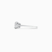 The Bouquet 14K White Gold Diamond Cluster Ring, 0.51 TCW, showcases a brilliant round center diamond framed by a halo of smaller diamonds, beautifully presented against a plain white background.