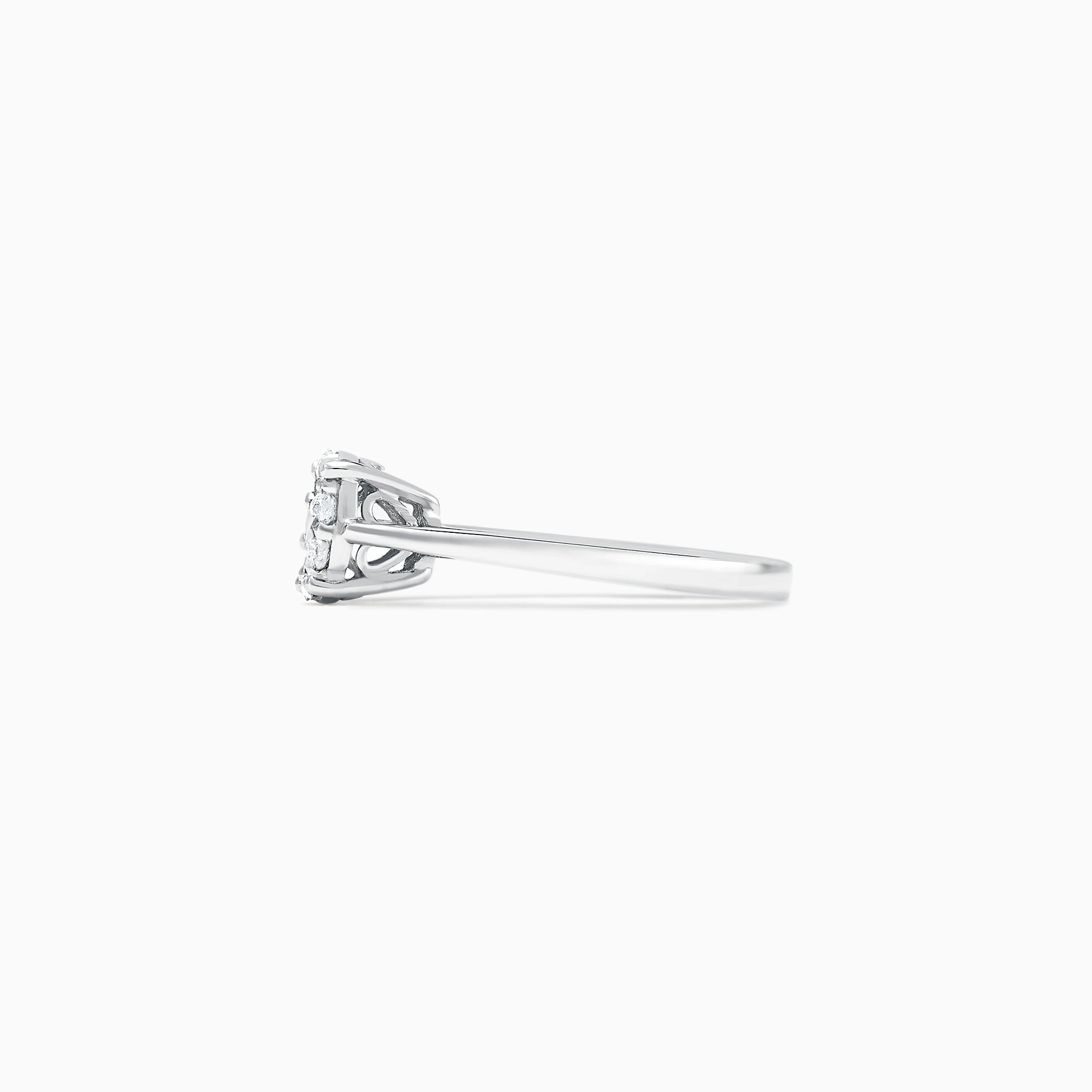 The Bouquet 14K White Gold Diamond Cluster Ring, 0.51 TCW, showcases a brilliant round center diamond framed by a halo of smaller diamonds, beautifully presented against a plain white background.