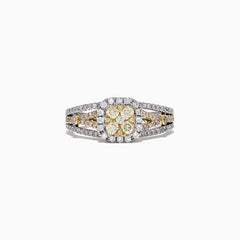 The Canare 14K Two-Tone Gold Cushion Shaped Cluster Yellow Diamond Ring showcases a yellow diamond center with a halo of white diamonds and a split shank band, creating a dazzling cluster effect.