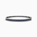 The Royale Bleu 14K White Gold Bangle features natural blue sapphires and diamonds (3.60 TCW) in a polished band, offering luxurious Effy style.