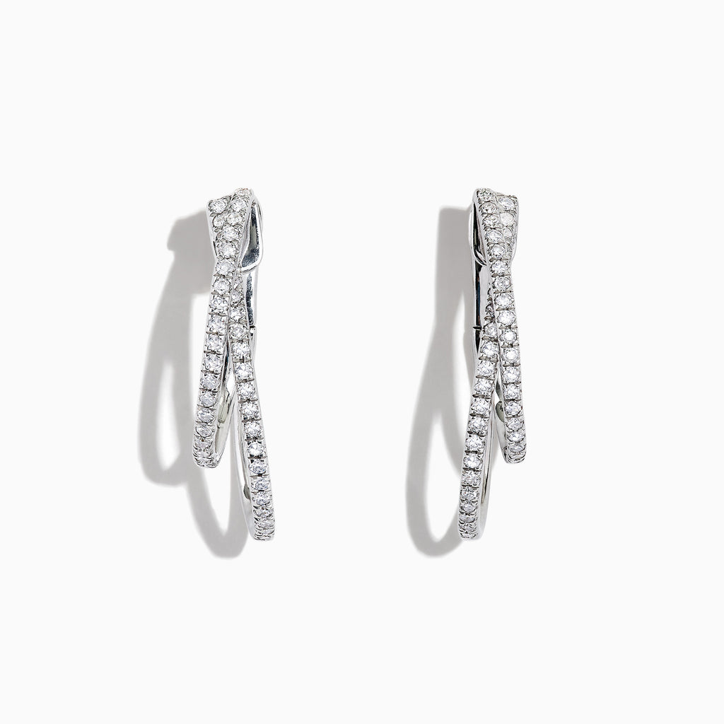 A pair of Pave Classica 14K White Gold Diamond Hoop Earrings, 0.58 TCW, featuring intertwined bands set with sparkling diamonds, elegantly displayed against a white background.