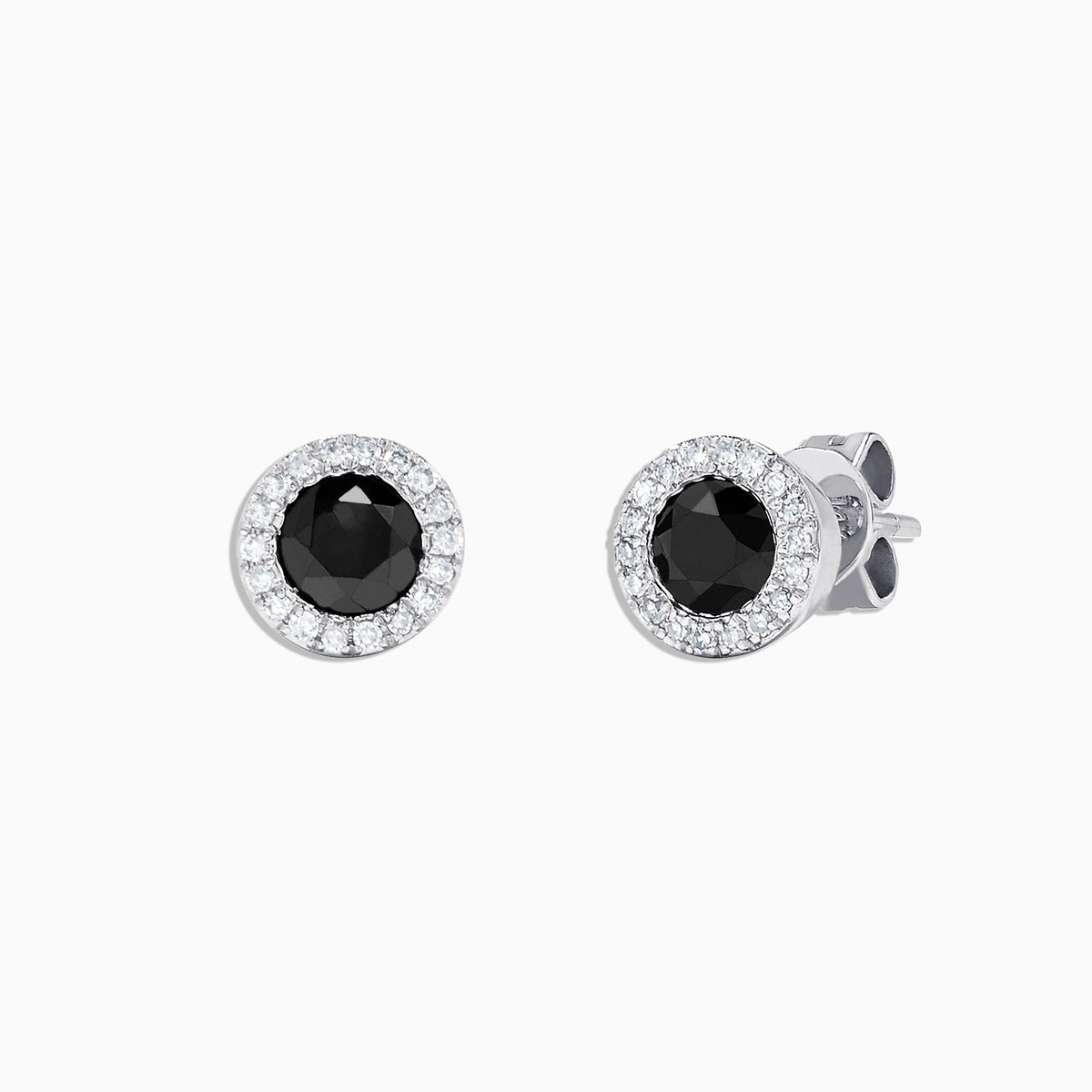 These 14K white gold stud earrings showcase a central black diamond surrounded by a halo of white diamonds, totaling 0.91 TCW for a timeless black and white design. Product: 14K White Gold Black and White Diamond Stud Earrings, 0.91 TCW.