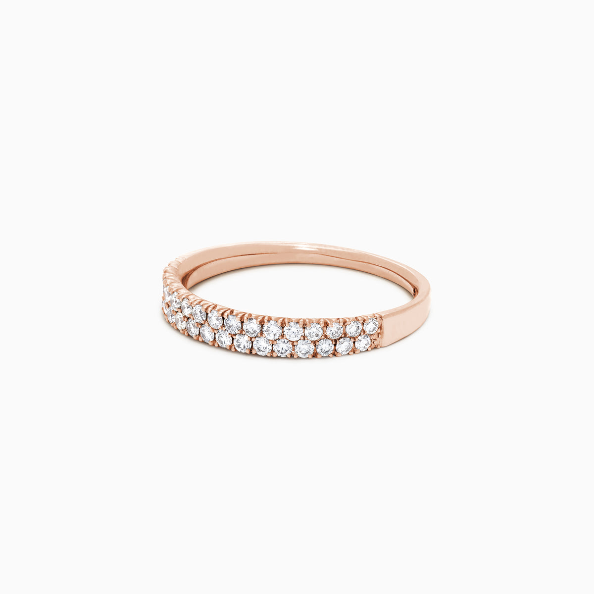 The Pave Rose 14K Rose Gold Two Row Pave Diamond Band, 0.37 TCW, showcases two rows of closely set round white diamonds in a 14K rose gold band, shown against a plain white background.