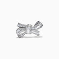 The Classique 14K White Gold Diamond Bow Ring, 1.08 TCW, features a striking bow design encrusted with diamonds and is showcased on a plain white background.