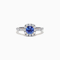 The Nahla Siri 14K Two Tone Gold Tanzanite & Diamond Ring, 1.45 TCW, features a cushion-cut tanzanite center surrounded by a diamond halo and more diamonds set along the band.